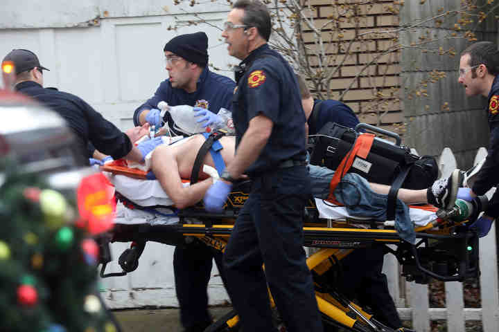 Toledo Fire & Rescue transport a man from the 2000 block of Genesee St. after an alleged shooting.